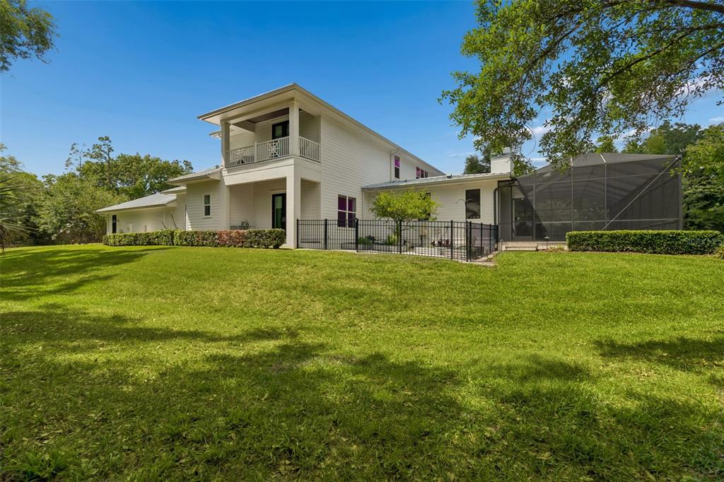 17001 Midas Lane Lutz, FL 33549 - Photo 87 of 100 a front view of a house with garden