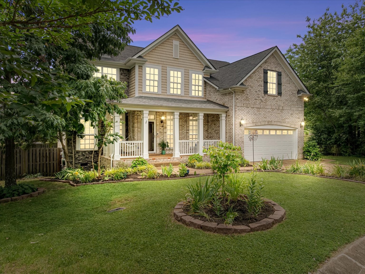 4055 Williford Way Spring Hill, TN 37174 - Photo 1 of 37 a front view of a house with a yard and trees