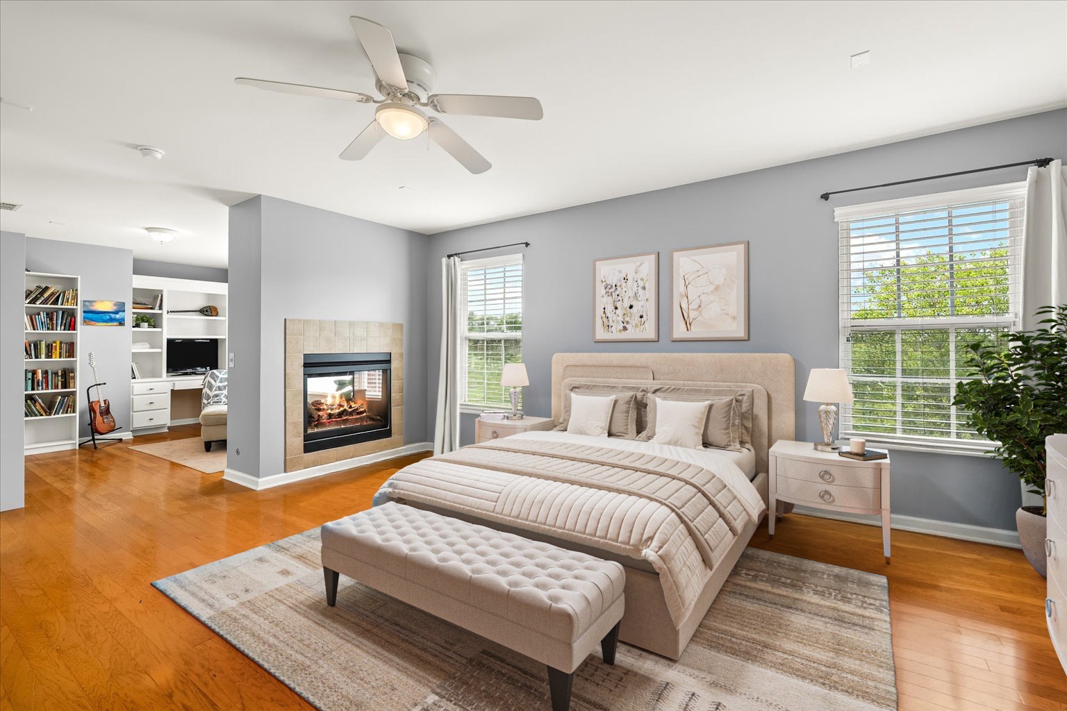 4055 Williford Way Spring Hill, TN 37174 - Photo 12 of 37 a spacious bedroom with a large bed a chandelier and windows