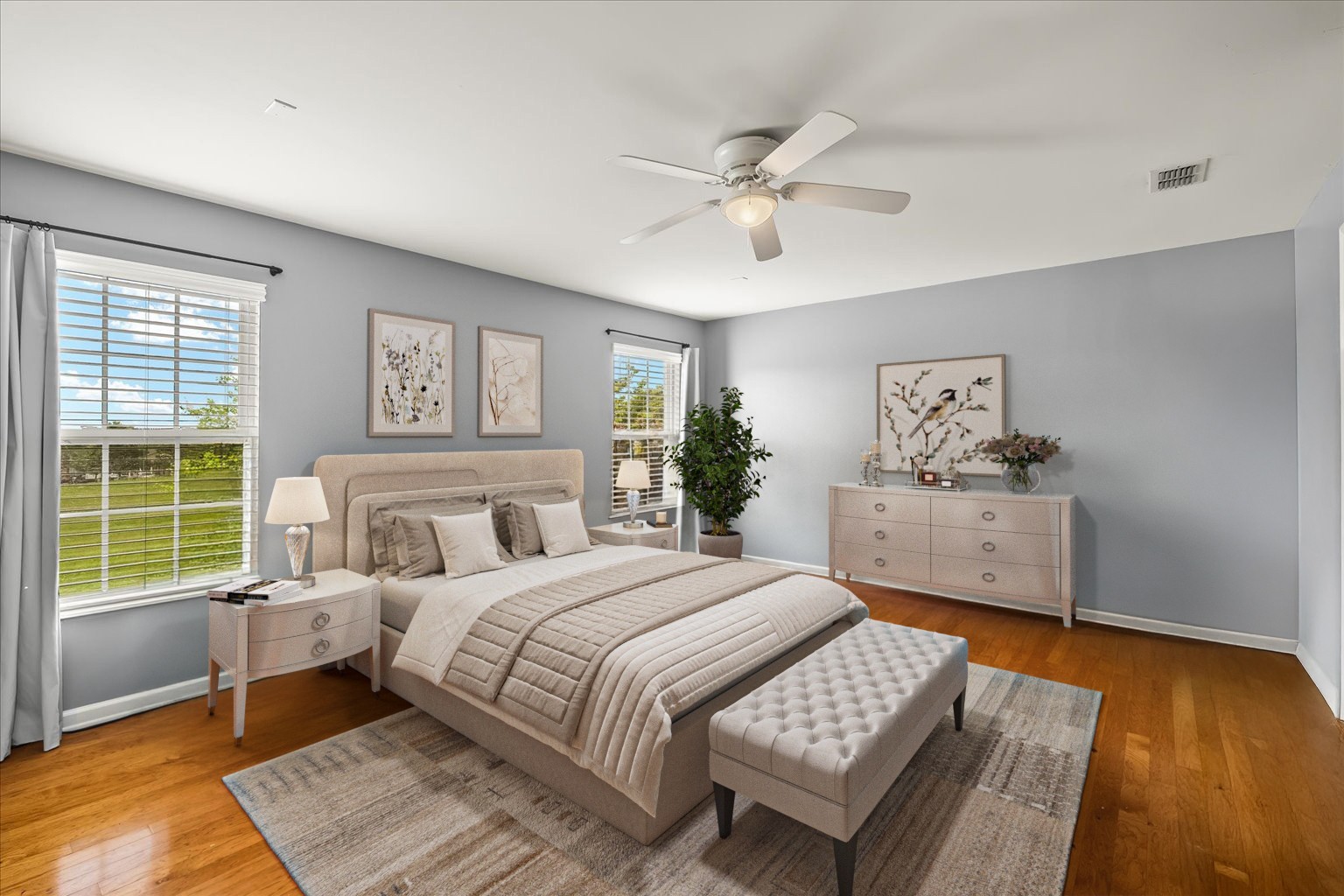 4055 Williford Way Spring Hill, TN 37174 - Photo 13 of 37 a bedroom with a large bed a lamp and a window