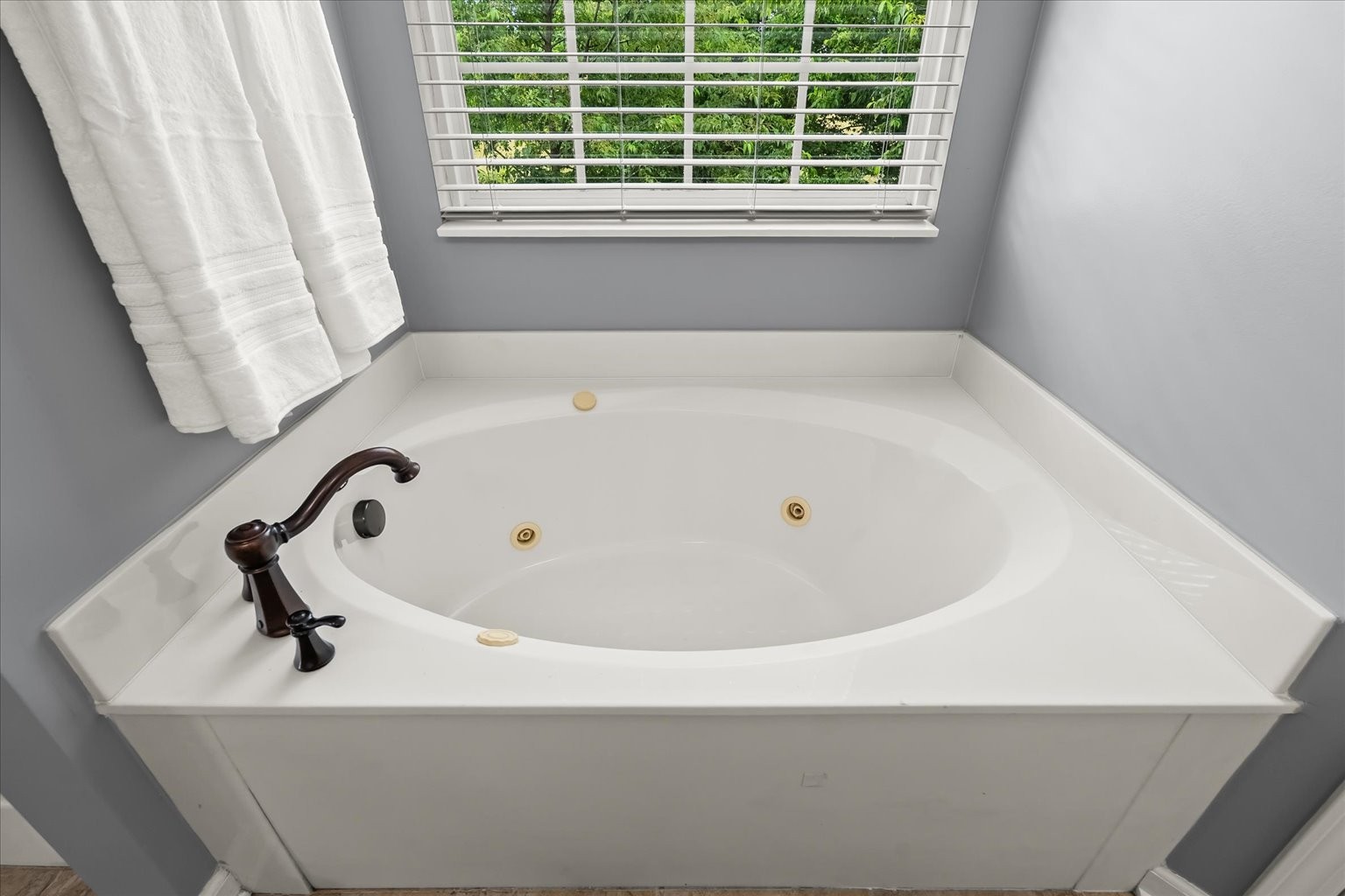 4055 Williford Way Spring Hill, TN 37174 - Photo 17 of 37 a bathroom with a bathtub