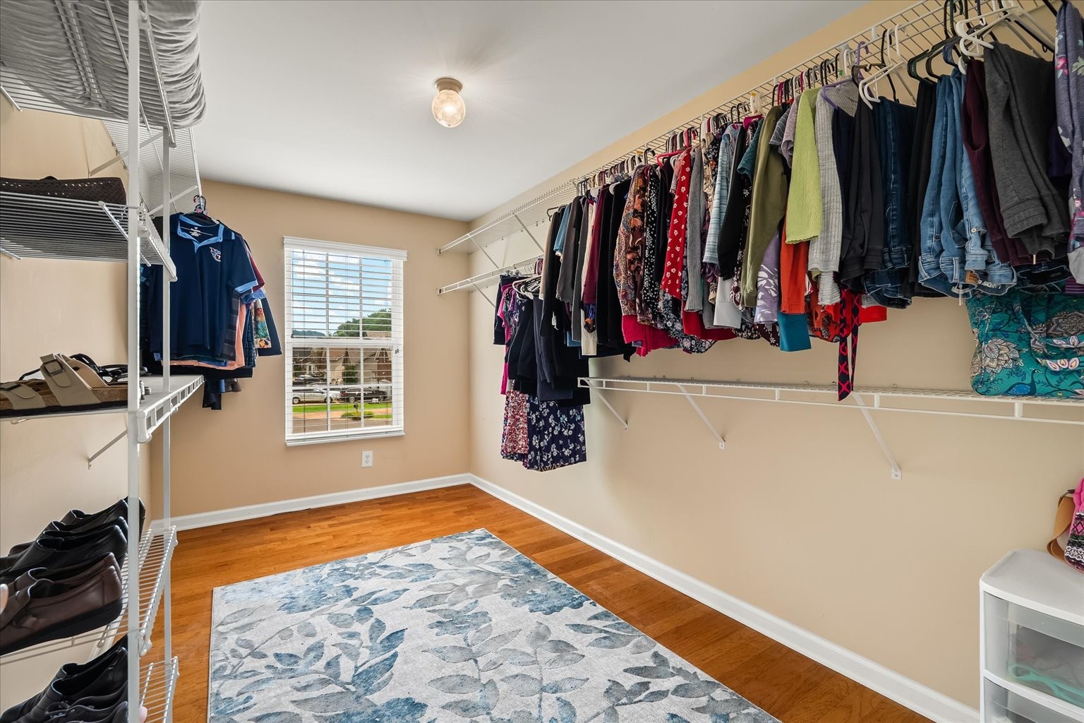 4055 Williford Way Spring Hill, TN 37174 - Photo 18 of 37 a view of walk in closet with clothes and shoes