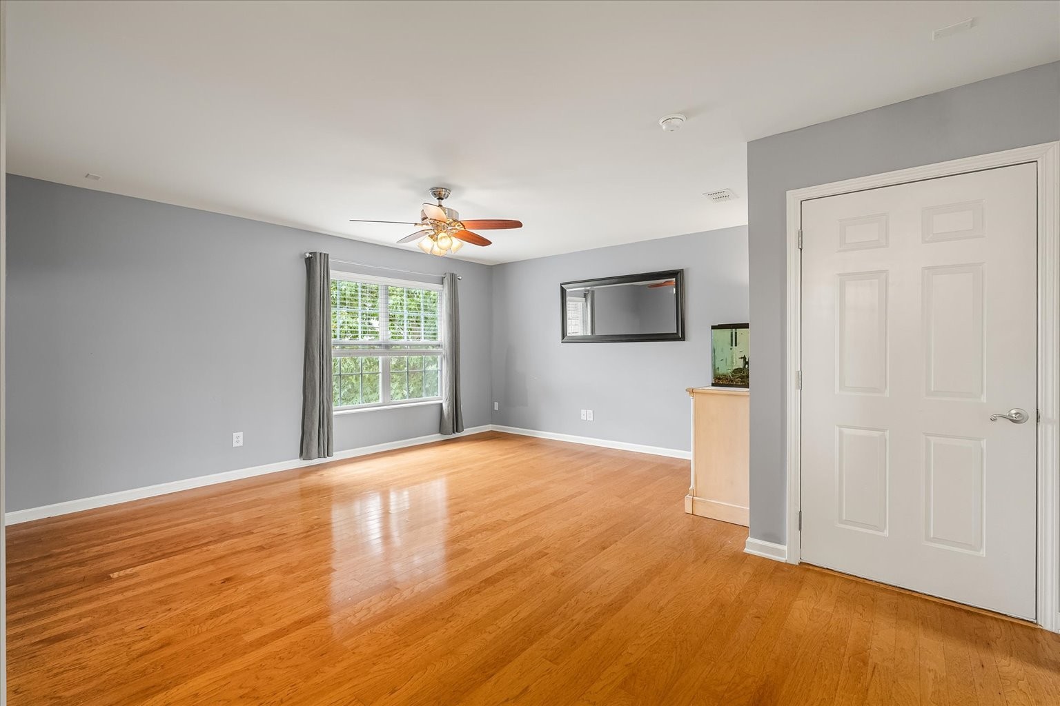 4055 Williford Way Spring Hill, TN 37174 - Photo 19 of 37 a view of a livingroom with wooden floor and window