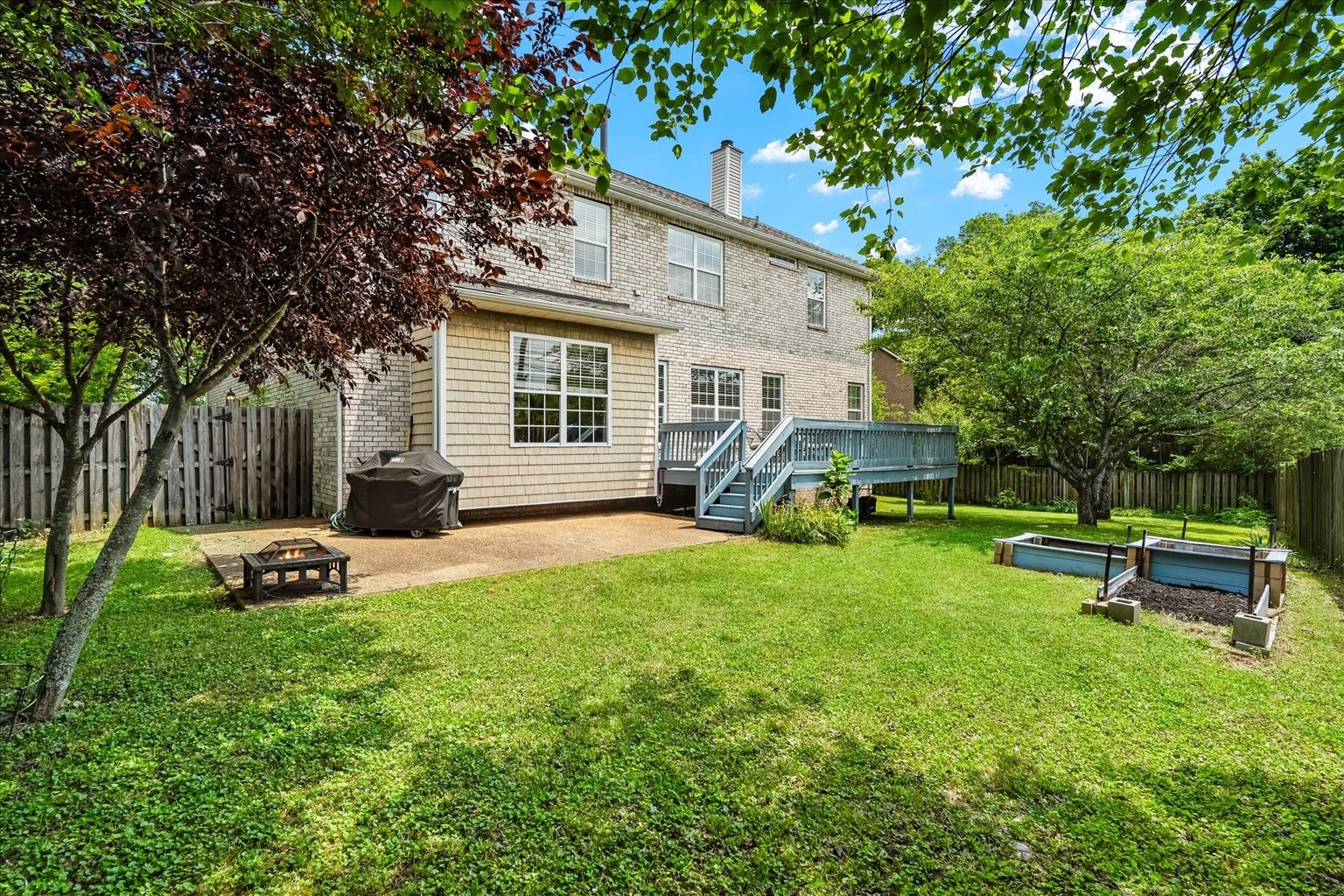 4055 Williford Way Spring Hill, TN 37174 - Photo 28 of 37 a view of a backyard with sitting area