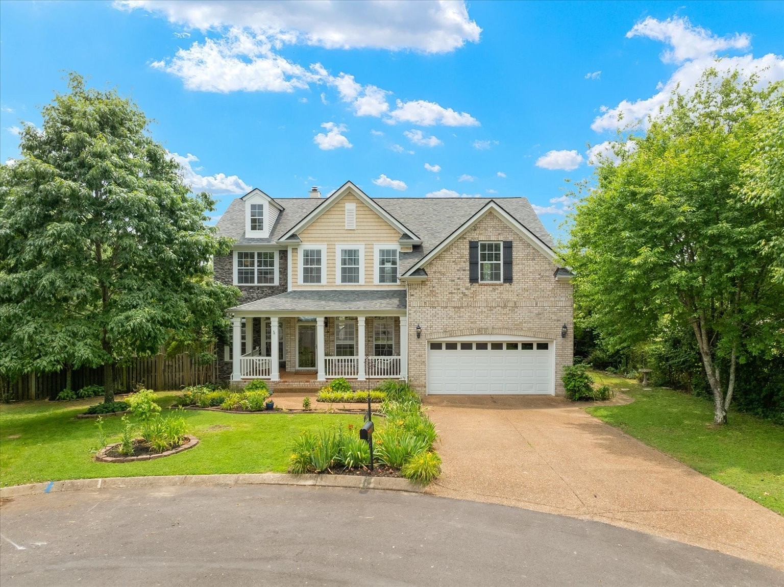 4055 Williford Way Spring Hill, TN 37174 - Photo 32 of 37 a front view of a house with a yard and trees