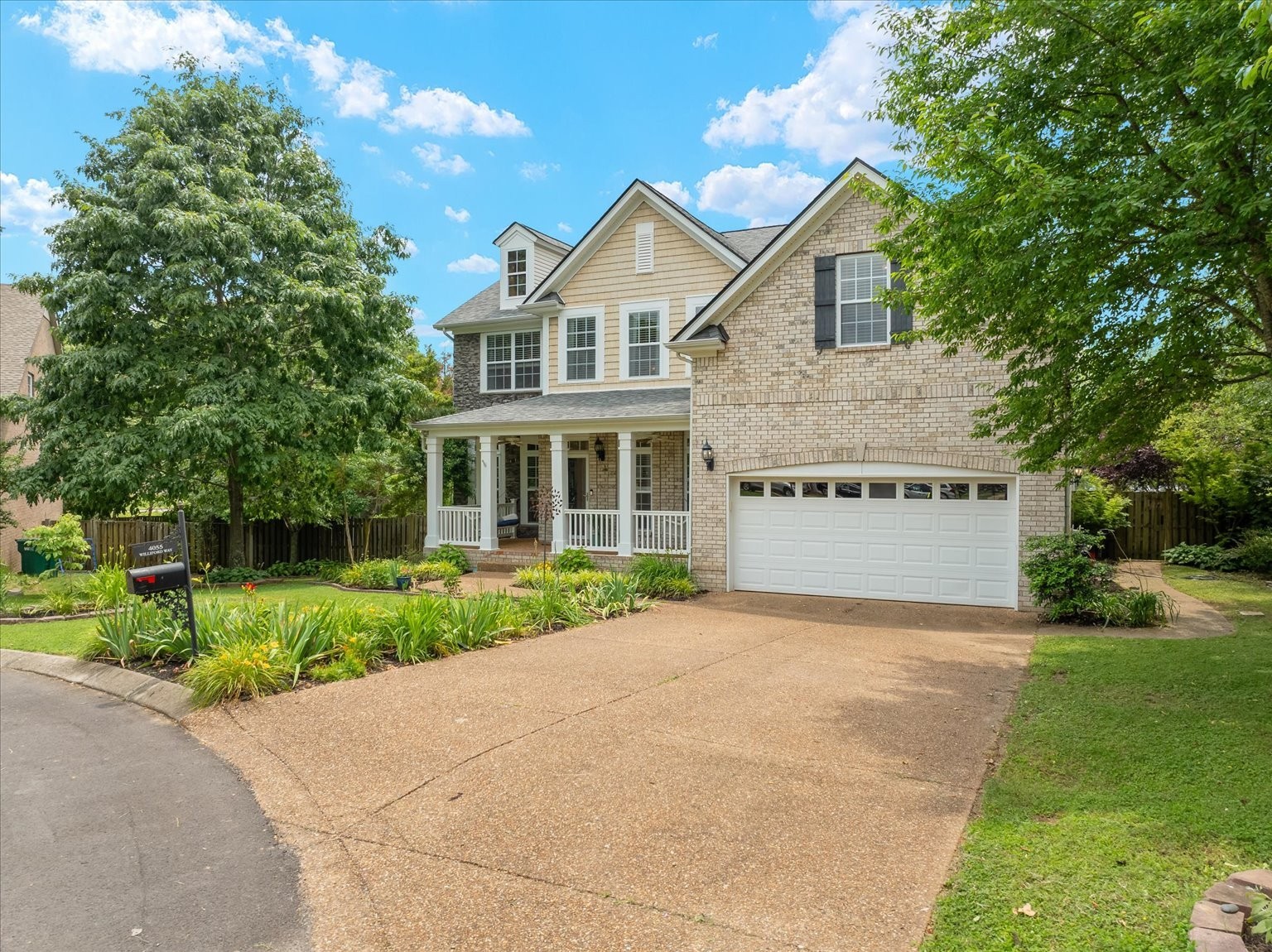 4055 Williford Way Spring Hill, TN 37174 - Photo 33 of 37 a front view of a house with a yard and garage