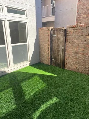 a view of a backyard with a garden