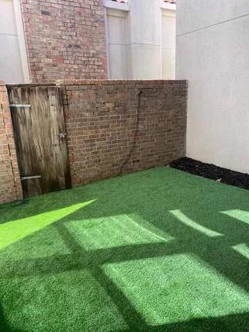 a view of a backyard with of the house