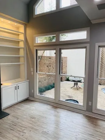 a view of an empty room and window