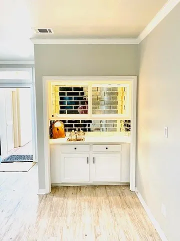 a view of kitchen with wooden floor