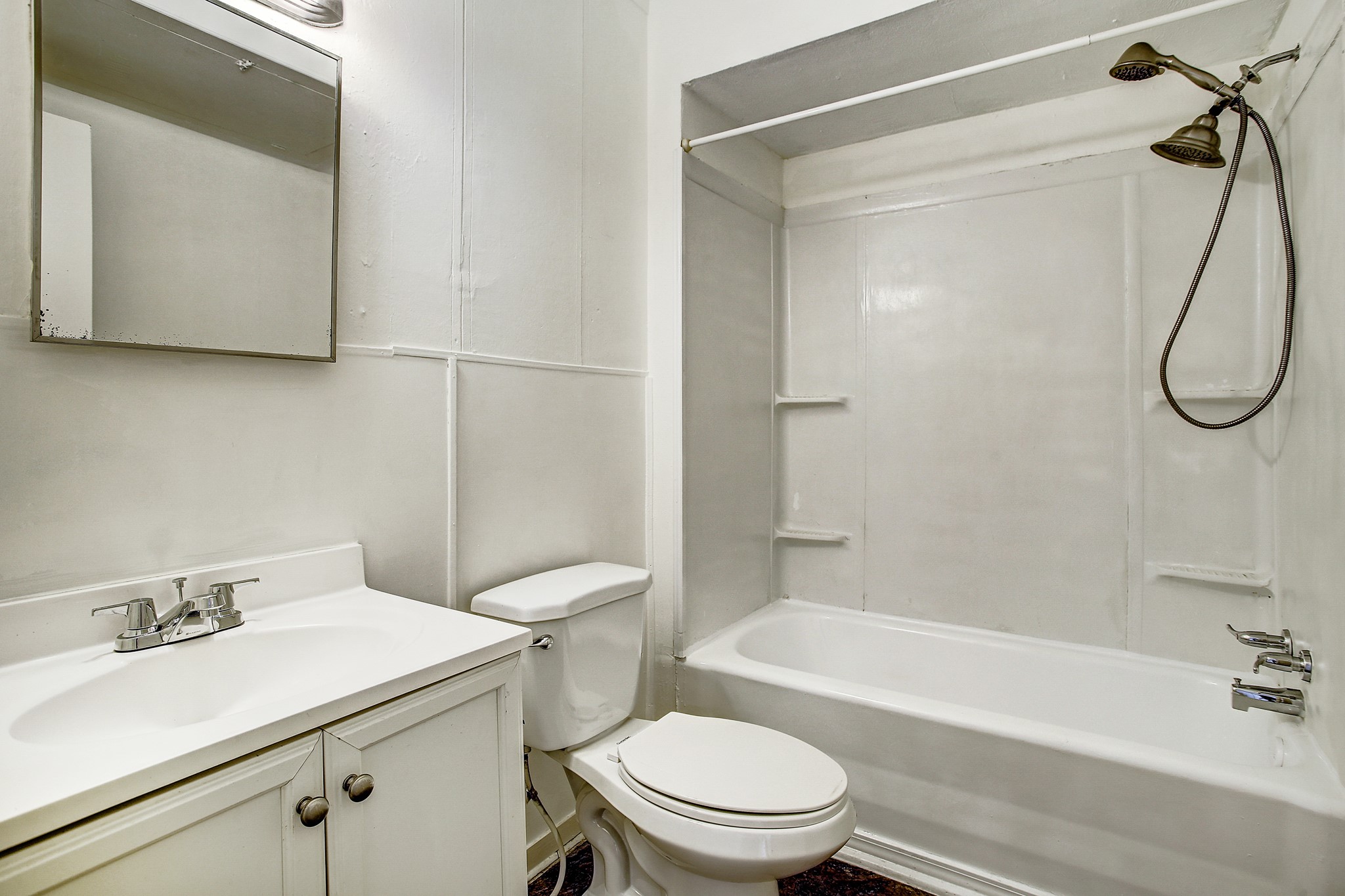 1127 Yale Street, Unit B Houston, TX 77008 - Photo 8 of 14 a bathroom with a sink toilet and shower