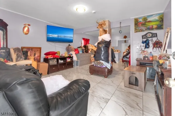 a living room filled with furniture and toys