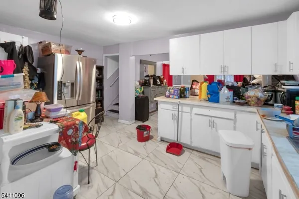 a view of storage utility and utility room