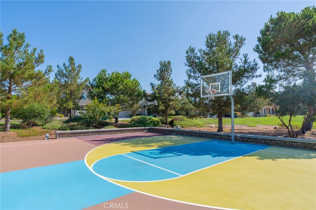 121 Baluster Irvine, CA 92618 - Photo 61 of 80 a view of a swimming pool with an outdoor space and seating area