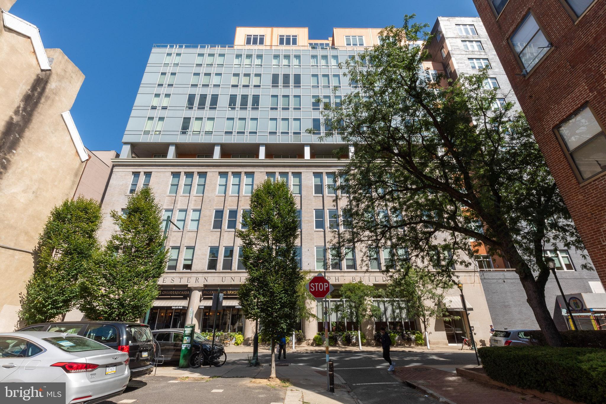 1101 Locust Street, Unit 4E Philadelphia, PA 19107 - Photo 15 of 15 a front view of a building with street view