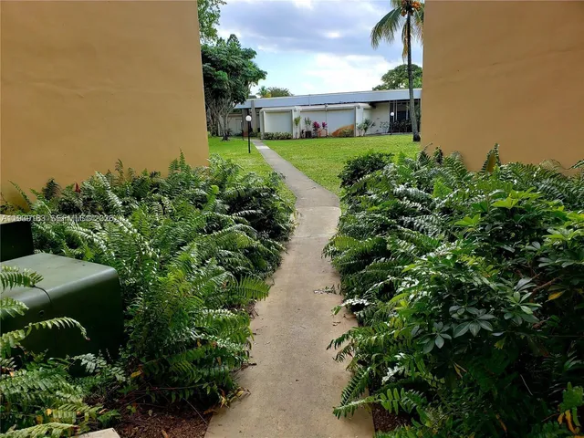 a view of building with yard