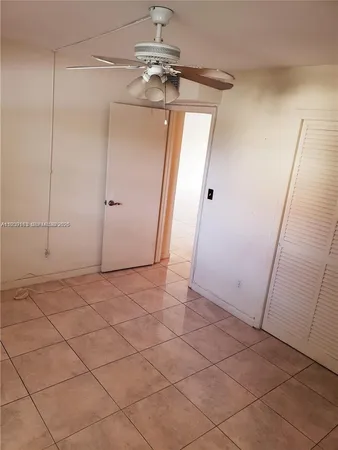 a bathroom with a toilet a sink and bathtub
