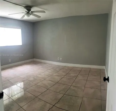 a bathroom with a shower sink and mirror