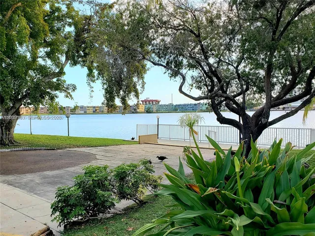 a view of a backyard and a patio