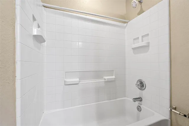 a bathroom with a bathtub