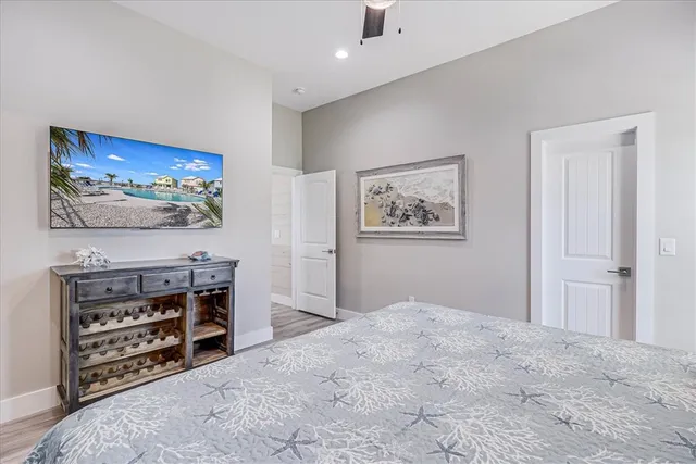 a view of a livingroom with furniture and a flat screen tv