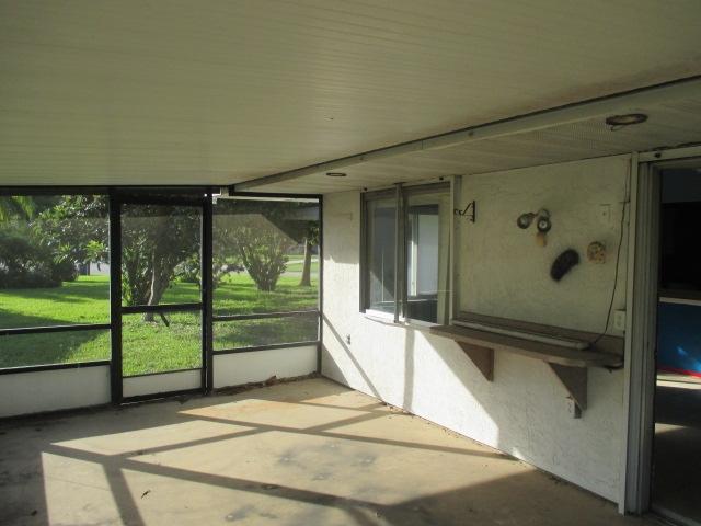 421 Southwest Ruffner Court Port St. Lucie, FL 34953 - Photo 11 of 16 M11 screened patio