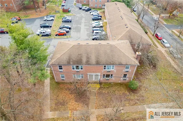 an aerial view of a house with a garden