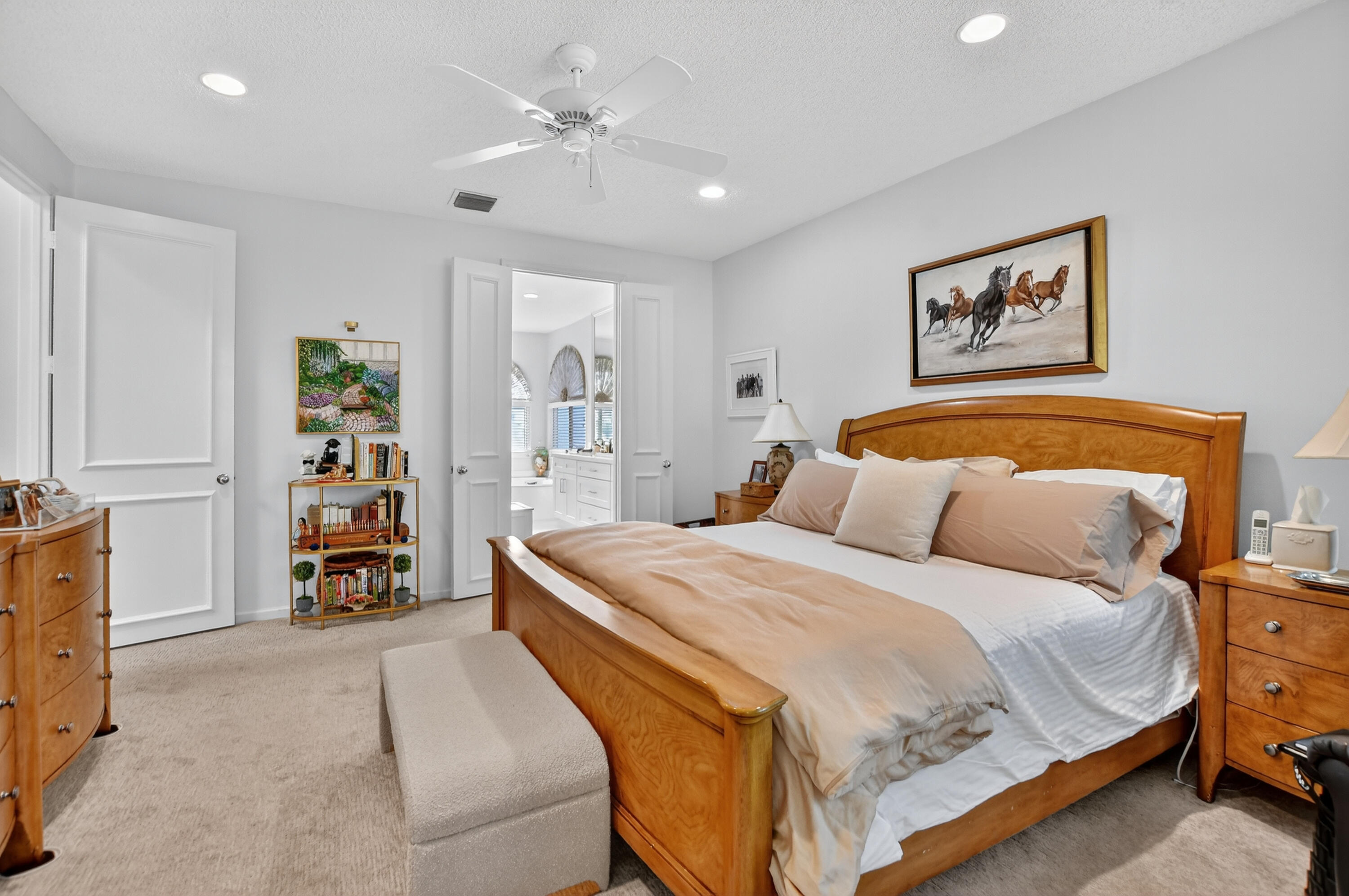 20220 Boca W Drive, Unit 202 Boca Raton, FL 33434 - Photo 27 of 129 a bedroom with a bed and a couch