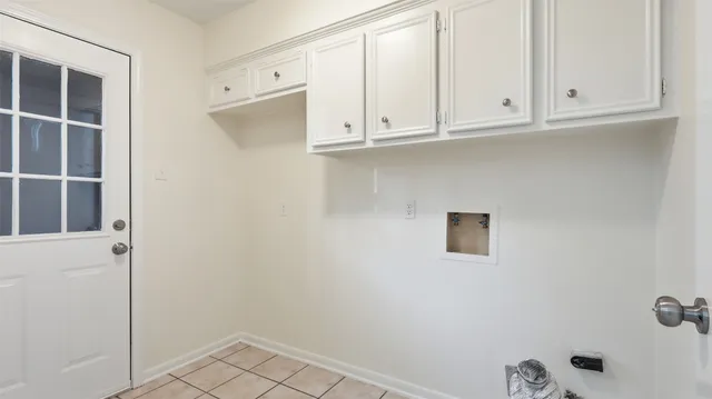 a view of cabinets and window