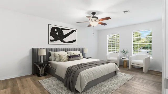 a bedroom with bed and a window