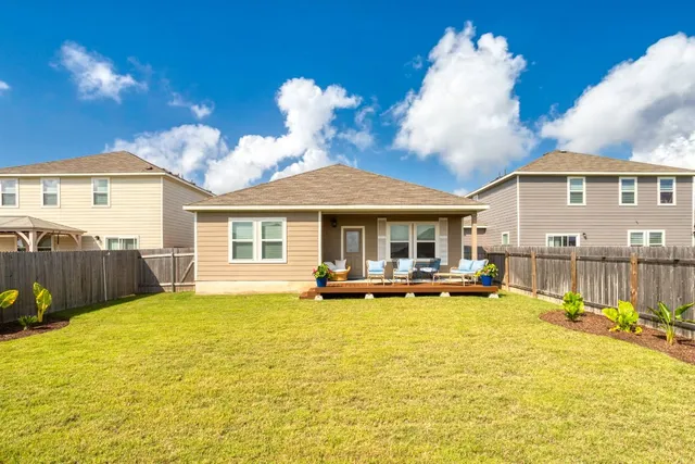 a view of a house with swimming pool