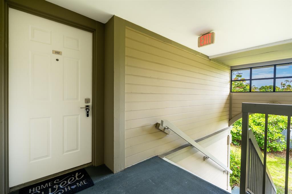 927 Northeast 199th Street, Unit 202 Miami, FL 33179 - Photo 22 of 39 a view of front door
