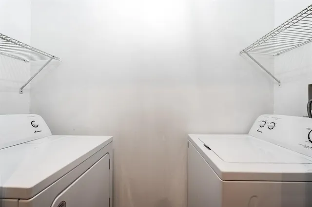 a view of kitchen and utility room