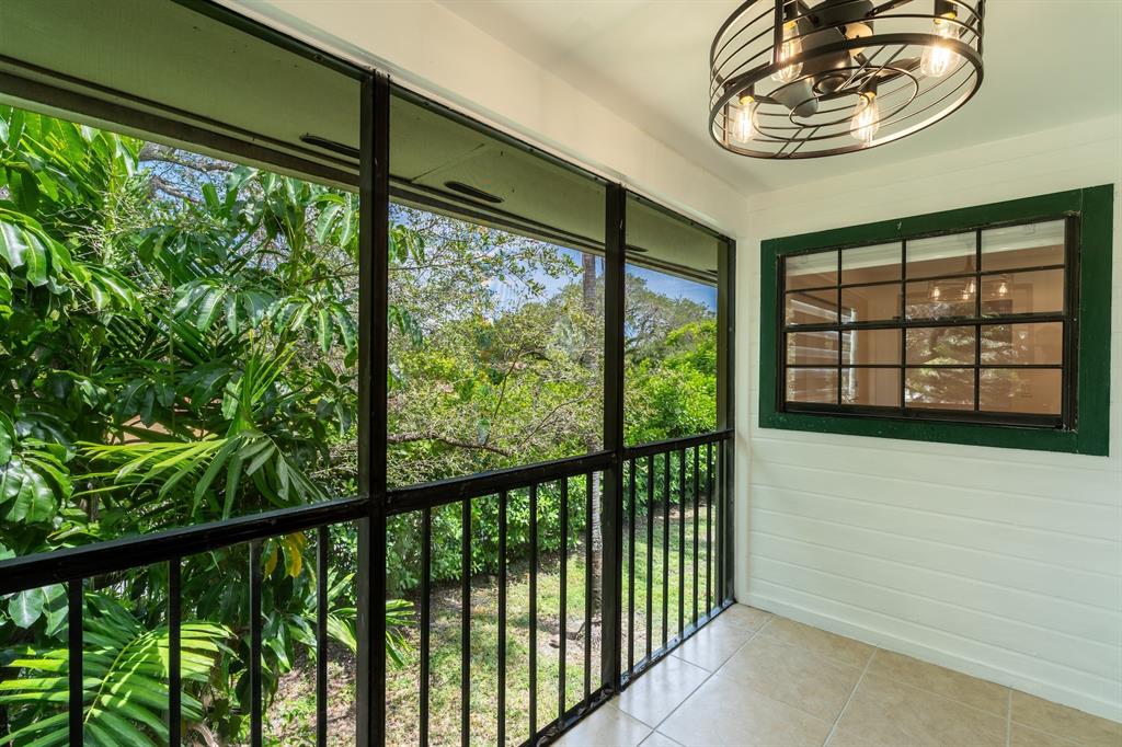 927 Northeast 199th Street, Unit 202 Miami, FL 33179 - Photo 39 of 39 a view of porch with a large window