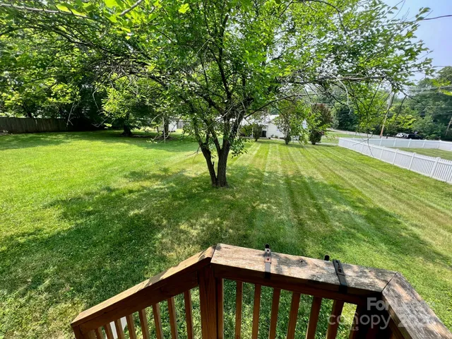 a view of backyard with green space