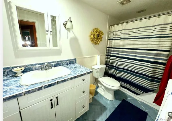 $399,900 | 280 Brettonwoods Drive, Coram, NY 11727