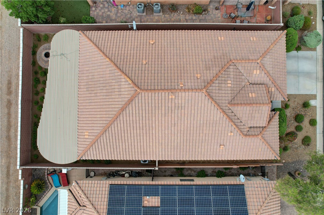 7049 Motley Road Las Vegas, NV 89178 - Photo 59 of 61 An aerial perspective showcases the classic tile roof design of this suburban home.