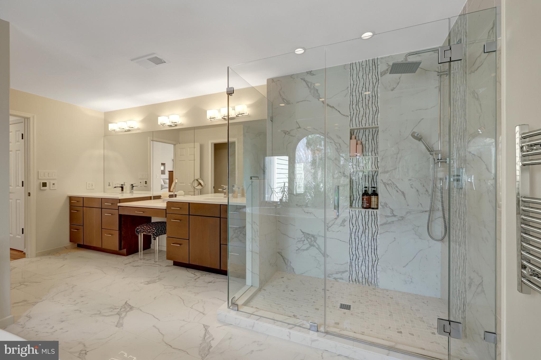 11122 Lakespray Way Reston, VA 20191 - Photo 44 of 77 Spacious, glass enclosed shower with stunning tile