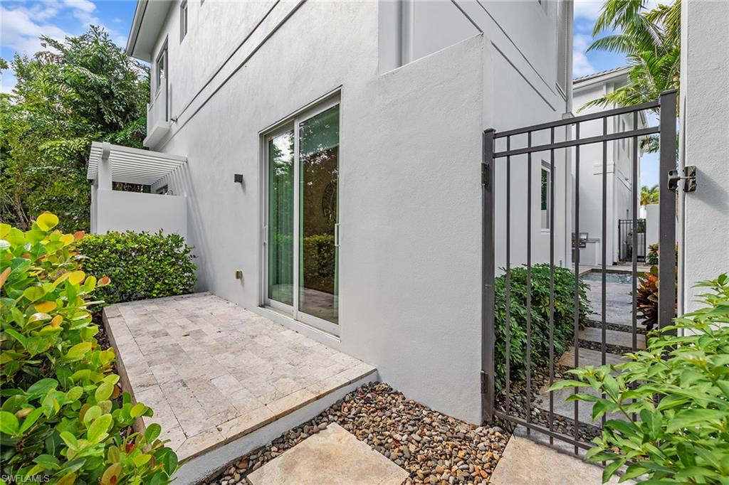 9149 Mercato Way Naples, FL 34108 - Photo 39 of 39 a view of a backyard