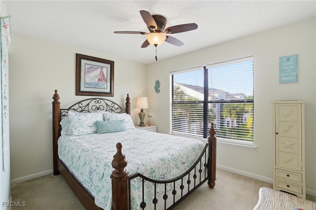 13581 Eagle Ridge Drive, Unit 1434 Fort Myers, FL 33912 - Photo 15 of 45 a bedroom with a bed and window