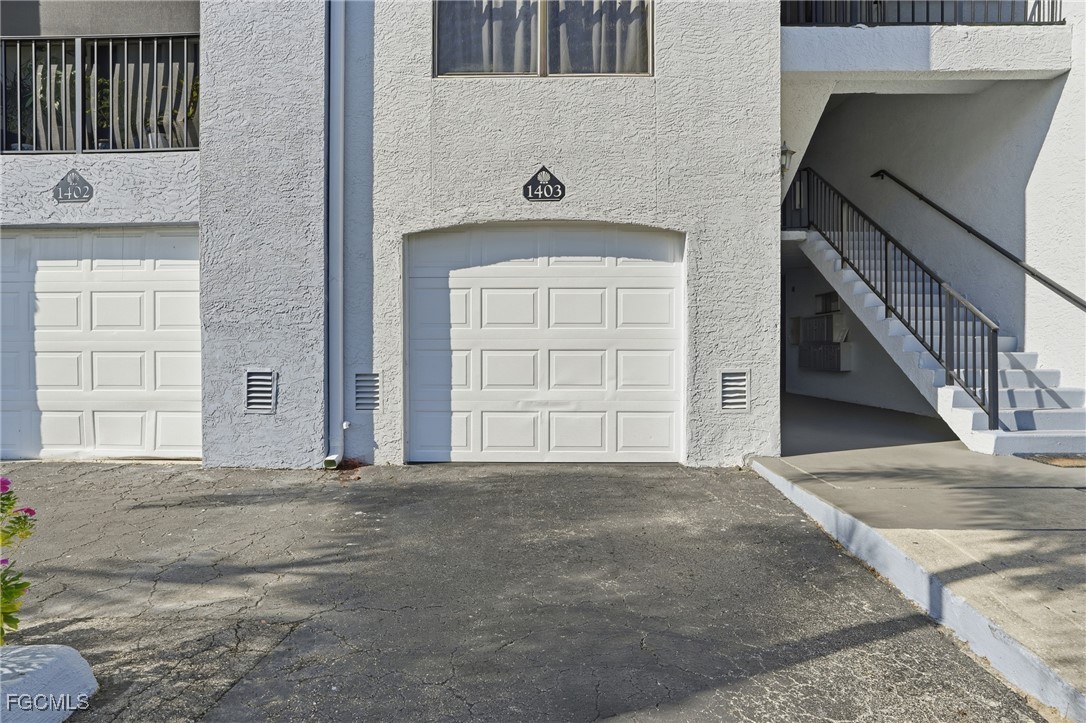 13581 Eagle Ridge Drive, Unit 1434 Fort Myers, FL 33912 - Photo 3 of 45 a view of an entrance door of the house