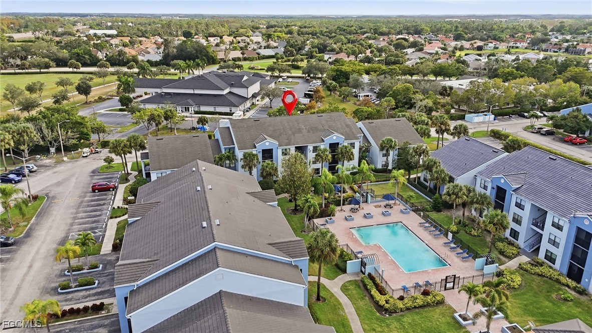13581 Eagle Ridge Drive, Unit 1434 Fort Myers, FL 33912 - Photo 32 of 45 an aerial view of residential houses with outdoor space