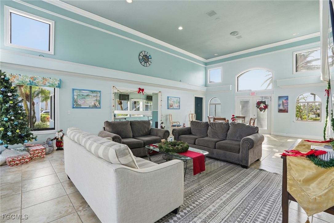 13581 Eagle Ridge Drive, Unit 1434 Fort Myers, FL 33912 - Photo 35 of 45 a living room with furniture and a couch