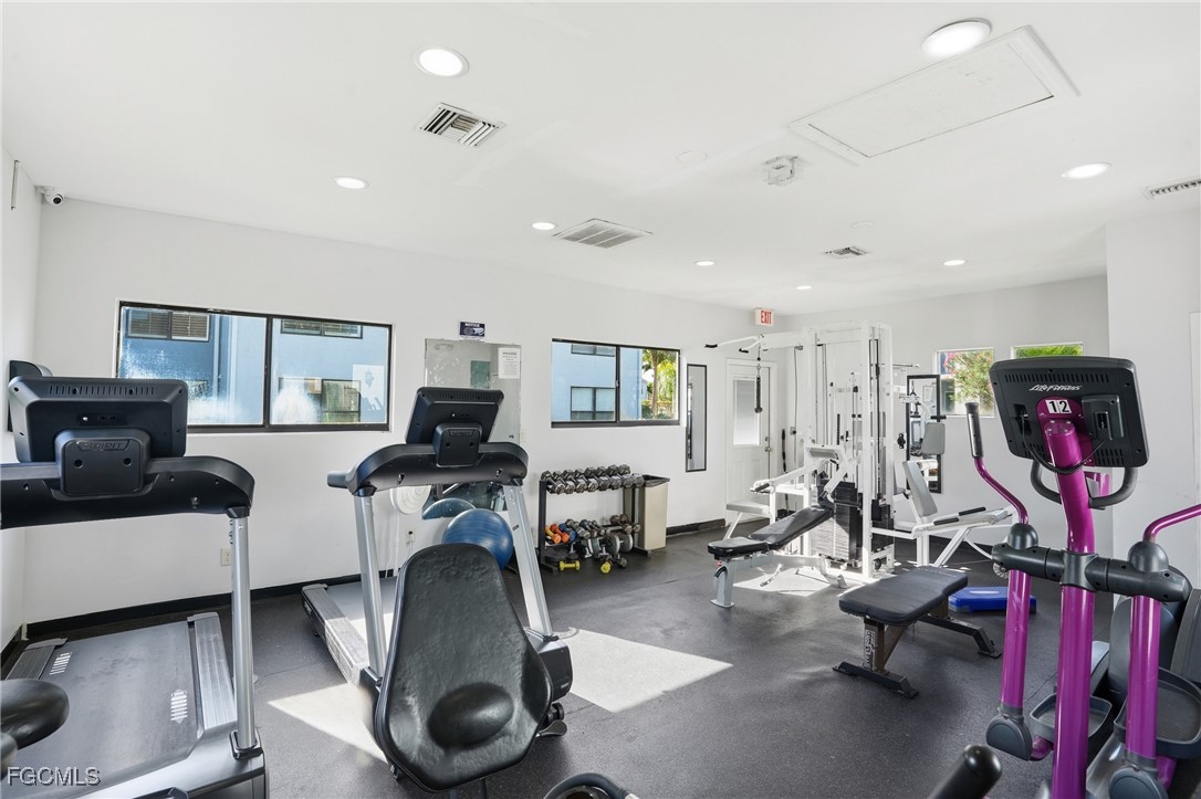 13581 Eagle Ridge Drive, Unit 1434 Fort Myers, FL 33912 - Photo 41 of 45 a view of a room with gym equipment