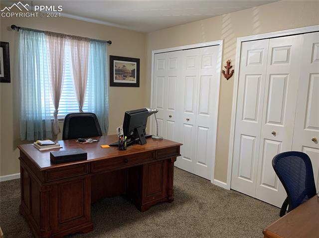 7501 Farmcrest Road Colorado Springs, CO 80925 - Photo 6 of 13 Bedroom/office on the main floor