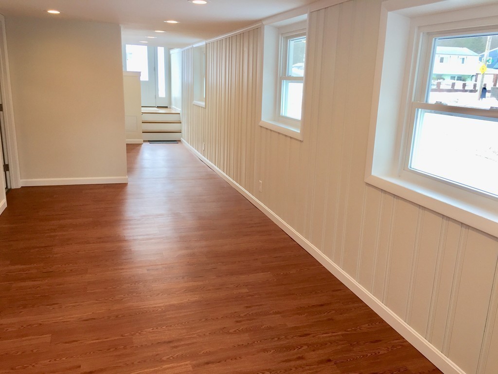 16 Alwin Street Boston, MA 02136 - Photo 16 of 19 a view of an entryway with wooden floor