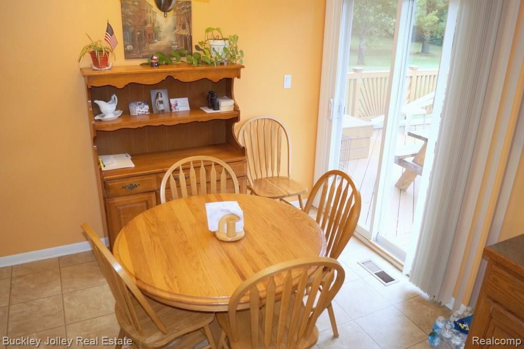 3347 Susan Drive Howell, MI 48855 - Photo 5 of 14 Slider to Deck from Dining Area