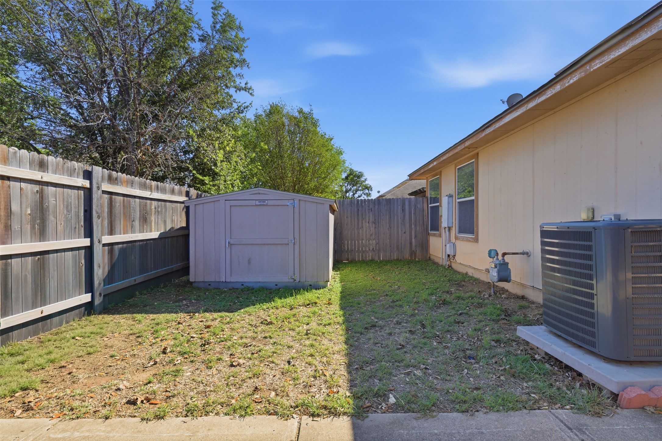 4529 Secure Lane, Unit 31 Austin, TX 78725 - Photo 28 of 38 a view of a backyard