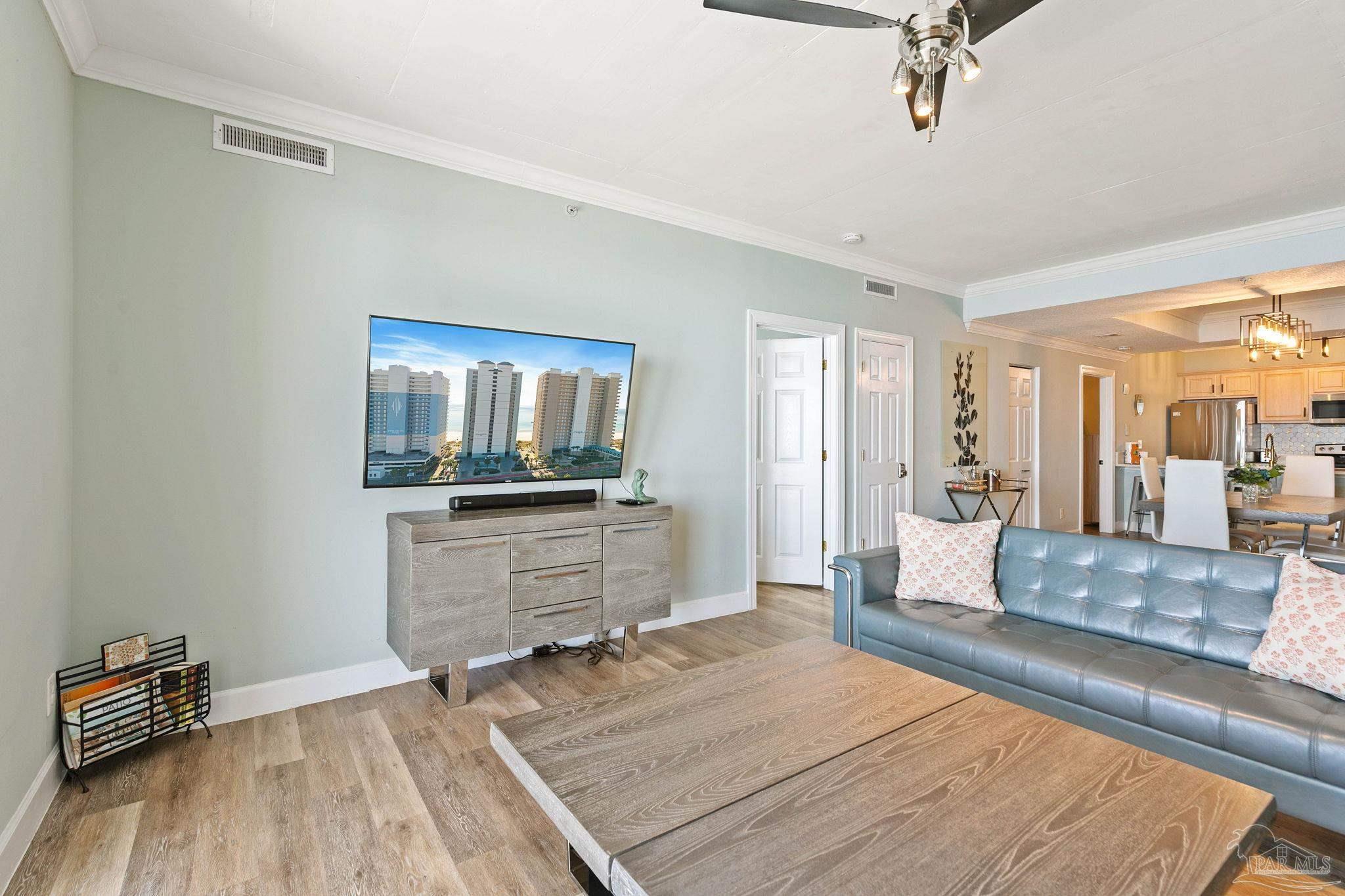 10611 Front Beach Road, Unit 1303 Panama City Beach, FL 32408 - Photo 17 of 71 a room with a couch and a view of living room
