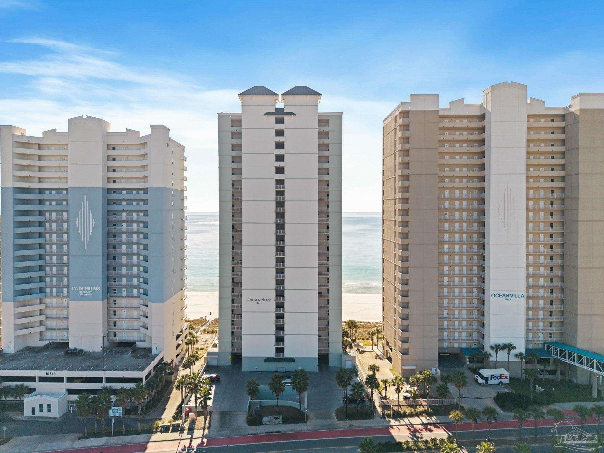 10611 Front Beach Road, Unit 1303 Panama City Beach, FL 32408 - Photo 2 of 71 a view of city with tall buildings